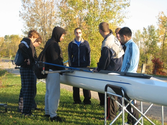 10  Varsity Men Prepping the Boat